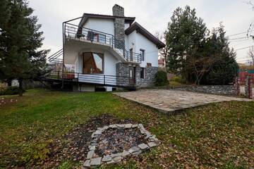 Фото номера Дом с 3 спальнями Дома для отпуска Casa Bucegi г. Бряза 4